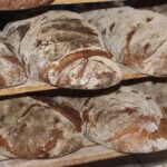Borgo storico con forni tradizionali per la produzione del pane nero secondo antiche ricette.